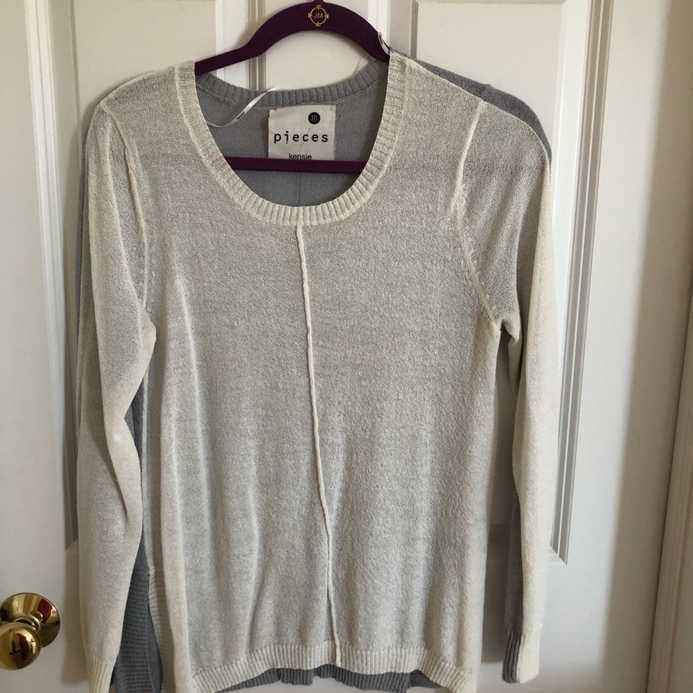 White and gray sweater